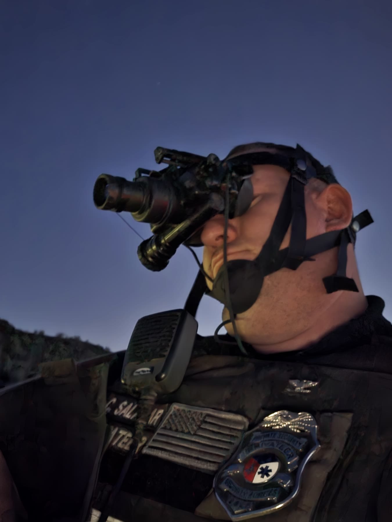 Privateer operative using night-vision equipment